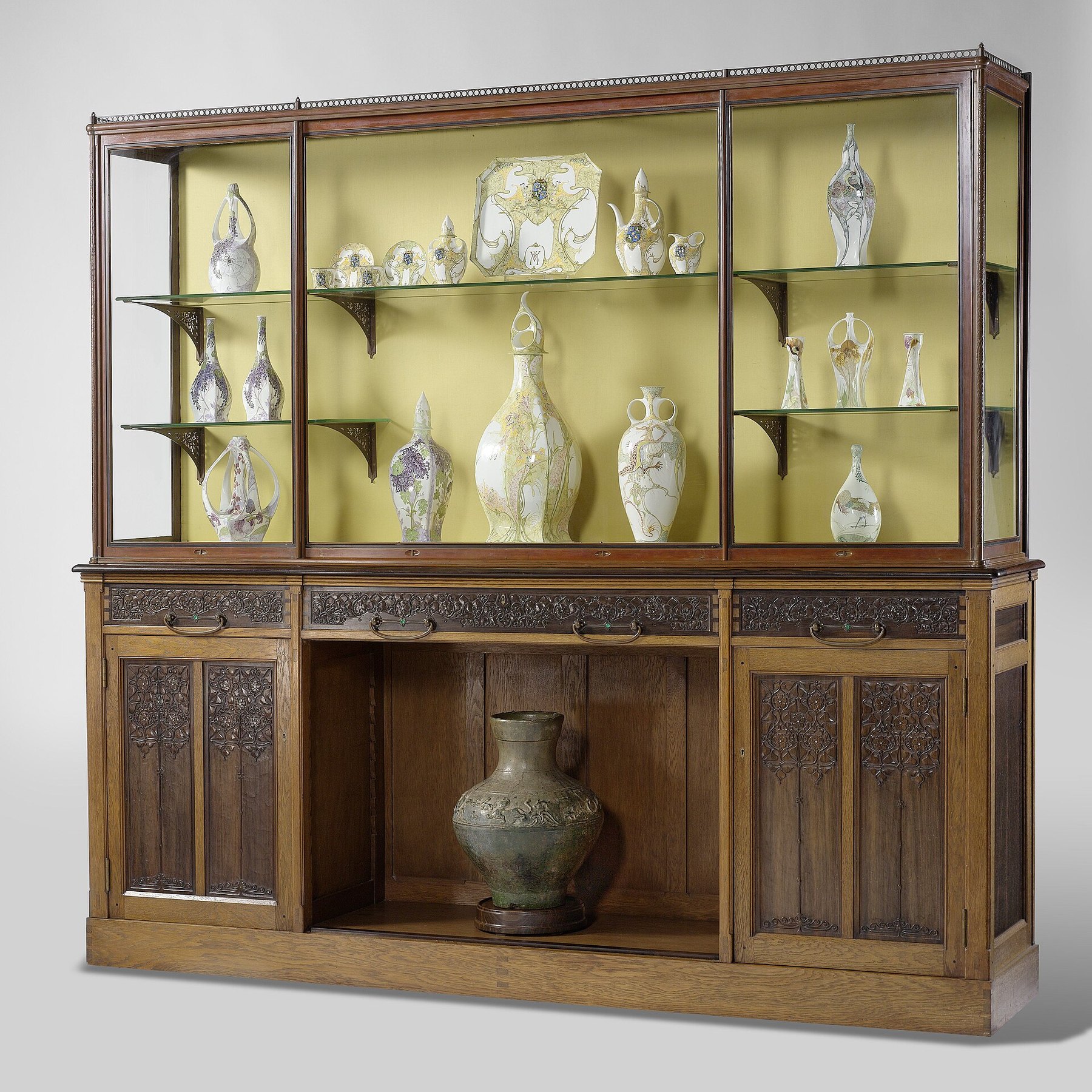 Wooden display cabinet with glass doors