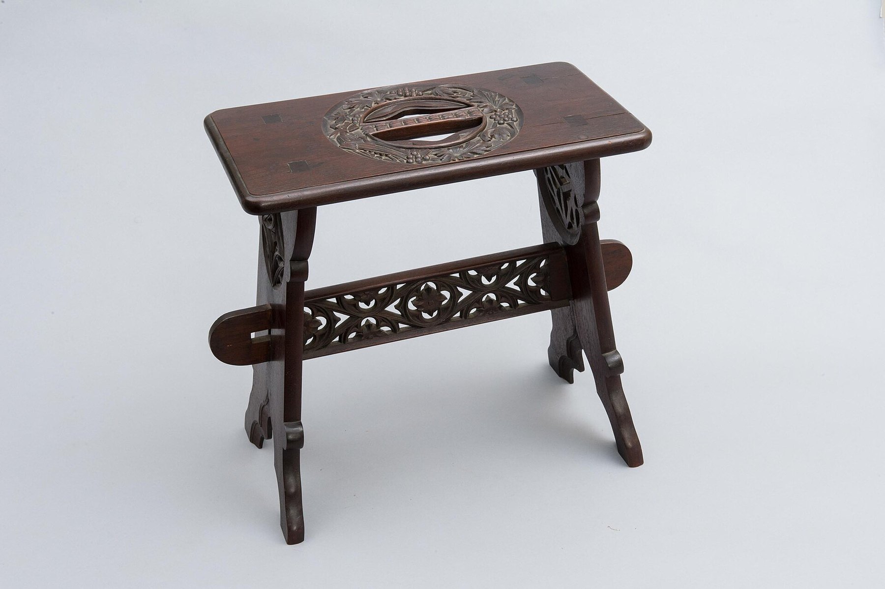 Small crafted wooden stool
